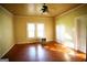Bright bedroom with hardwood floors and a window at 10 Maranatha Rd, Mcdonough, GA 30252