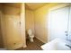 Simple bathroom with shower, toilet, and sink at 10 Maranatha Rd, Mcdonough, GA 30252
