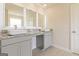 Bathroom with double vanity and granite countertop at 110 Jacoby Dr # 109, Fairburn, GA 30213