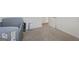 Bright bedroom with crib and carpeted floor at 104 Montgomery Dr, Stockbridge, GA 30281