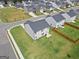 Aerial view of a house with backyard and wooden fence at 104 Montgomery Dr, Stockbridge, GA 30281