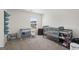 Bedroom with crib, changing table and wall organizer at 104 Montgomery Dr, Stockbridge, GA 30281