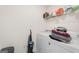 Laundry room with washer, dryer, and shelving at 104 Montgomery Dr, Stockbridge, GA 30281