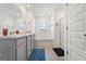 Main bathroom boasts a soaking tub, double vanity, and walk-in shower at 104 Montgomery Dr, Stockbridge, GA 30281