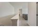 Bright hallway with carpeted flooring and white walls at 104 Montgomery Dr, Stockbridge, GA 30281