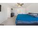 Spacious bedroom with large bed, dresser, and ceiling fan at 104 Montgomery Dr, Stockbridge, GA 30281