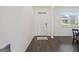Bright and airy entryway with dark hardwood floors at 104 Montgomery Dr, Stockbridge, GA 30281