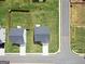 Aerial view of two houses with backyards in a residential area at 104 Montgomery Dr, Stockbridge, GA 30281