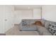 Comfortable living room with sectional sofa and carpeted floor at 104 Montgomery Dr, Stockbridge, GA 30281