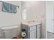 Simple bathroom with grey vanity and a toilet at 104 Montgomery Dr, Stockbridge, GA 30281