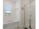 Bathroom with soaking tub and walk-in shower at 104 Montgomery Dr, Stockbridge, GA 30281