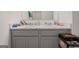 Modern bathroom with double vanity and marble countertop at 104 Montgomery Dr, Stockbridge, GA 30281