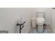 Convenient half bathroom with toilet and small sink at 104 Montgomery Dr, Stockbridge, GA 30281