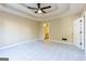 Main bedroom with ensuite bathroom access and ceiling fan at 5761 Newnan Cir, Austell, GA 30106