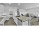 Modern kitchen with granite countertops and stainless steel appliances at 114 Jacoby Dr # 111, Fairburn, GA 30213