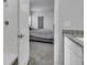 Bathroom with a walk-in shower and granite countertop at 114 Jacoby Dr # 111, Fairburn, GA 30213