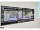 Sleek electric fireplace perfect for ambiance and warmth at 114 Jacoby Dr # 111, Fairburn, GA 30213