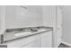 Double vanity bathroom with granite countertops at 114 Jacoby Dr # 111, Fairburn, GA 30213