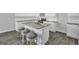 Kitchen island with granite countertop and seating for three at 114 Jacoby Dr # 111, Fairburn, GA 30213