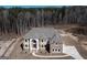 Large home with a wraparound porch and expansive wooded lot at 230 Waltham Way, Fayetteville, GA 30214