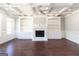Spacious living room with hardwood floors and a coffered ceiling at 230 Waltham Way, Fayetteville, GA 30214