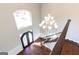 Elegant foyer with hardwood floors and chandelier at 230 Waltham Way, Fayetteville, GA 30214
