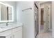 Bathroom with a walk-in shower, modern vanity, and marble countertop at 230 Waltham Way, Fayetteville, GA 30214