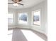 Bright bedroom with three windows and neutral decor at 230 Waltham Way, Fayetteville, GA 30214