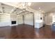 Open living room with hardwood floors and built-in shelving at 230 Waltham Way, Fayetteville, GA 30214
