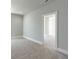 Spacious bedroom with neutral walls and carpet at 230 Waltham Way, Fayetteville, GA 30214
