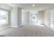 Bright bedroom featuring two windows and carpeted floors at 230 Waltham Way, Fayetteville, GA 30214