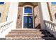 Elegant front entrance with ornate double doors at 230 Waltham Way, Fayetteville, GA 30214