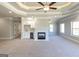 Large main bedroom with a fireplace, wet bar and bathroom access at 230 Waltham Way, Fayetteville, GA 30214