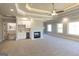 Main bedroom features a fireplace, wet bar, and ensuite bathroom access at 230 Waltham Way, Fayetteville, GA 30214