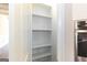 Walk-in pantry with ample shelving for storage at 230 Waltham Way, Fayetteville, GA 30214