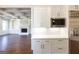Kitchen with white cabinets, quartz countertops, and stainless steel appliances at 230 Waltham Way, Fayetteville, GA 30214