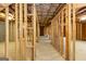 Unfinished basement with framed walls and exposed utilities at 230 Waltham Way, Fayetteville, GA 30214