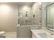 Modern bathroom with a large glass shower at 230 Waltham Way, Fayetteville, GA 30214