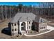 Two-story brick home with a large yard at 230 Waltham Way, Fayetteville, GA 30214