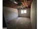 Unfinished bedroom with drywall and exposed framing at 1569 King Mill Rd, Mcdonough, GA 30252