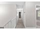 Upper level hallway with carpet and neutral-colored walls at 101 Southwind Reach, Peachtree City, GA 30269