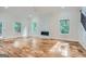 Spacious living room with hardwood floors and a modern fireplace at 1055 Church St, Smyrna, GA 30080