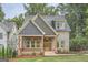 Modern two-story home with gray siding and a front porch at 1055 Church St, Smyrna, GA 30080