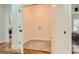Convenient laundry room with stylish tile floor and built-in shelving at 1055 Church St, Smyrna, GA 30080