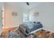 Light and airy bedroom with hardwood floors and unique rug at 1055 Church St, Smyrna, GA 30080