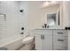 Modern bathroom with white subway tile and a white vanity at 1055 Church St, Smyrna, GA 30080