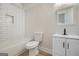 Clean basement bathroom with white subway tile and modern vanity at 1055 Church St, Smyrna, GA 30080