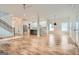 Open concept kitchen boasts modern cabinetry, island, and hardwood floors at 1055 Church St, Smyrna, GA 30080