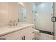 Spa-like bathroom with hexagon tile and a floating vanity at 1055 Church St, Smyrna, GA 30080