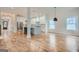 Open concept dining area with hardwood floors and access to the kitchen at 1055 Church St, Smyrna, GA 30080